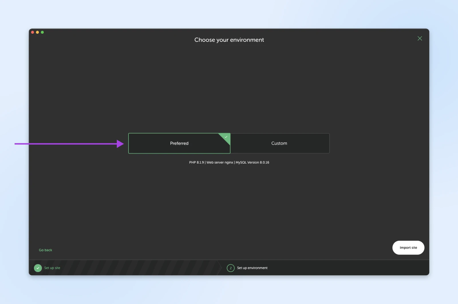 Local by Flywheel environment selection screen with purple arrow